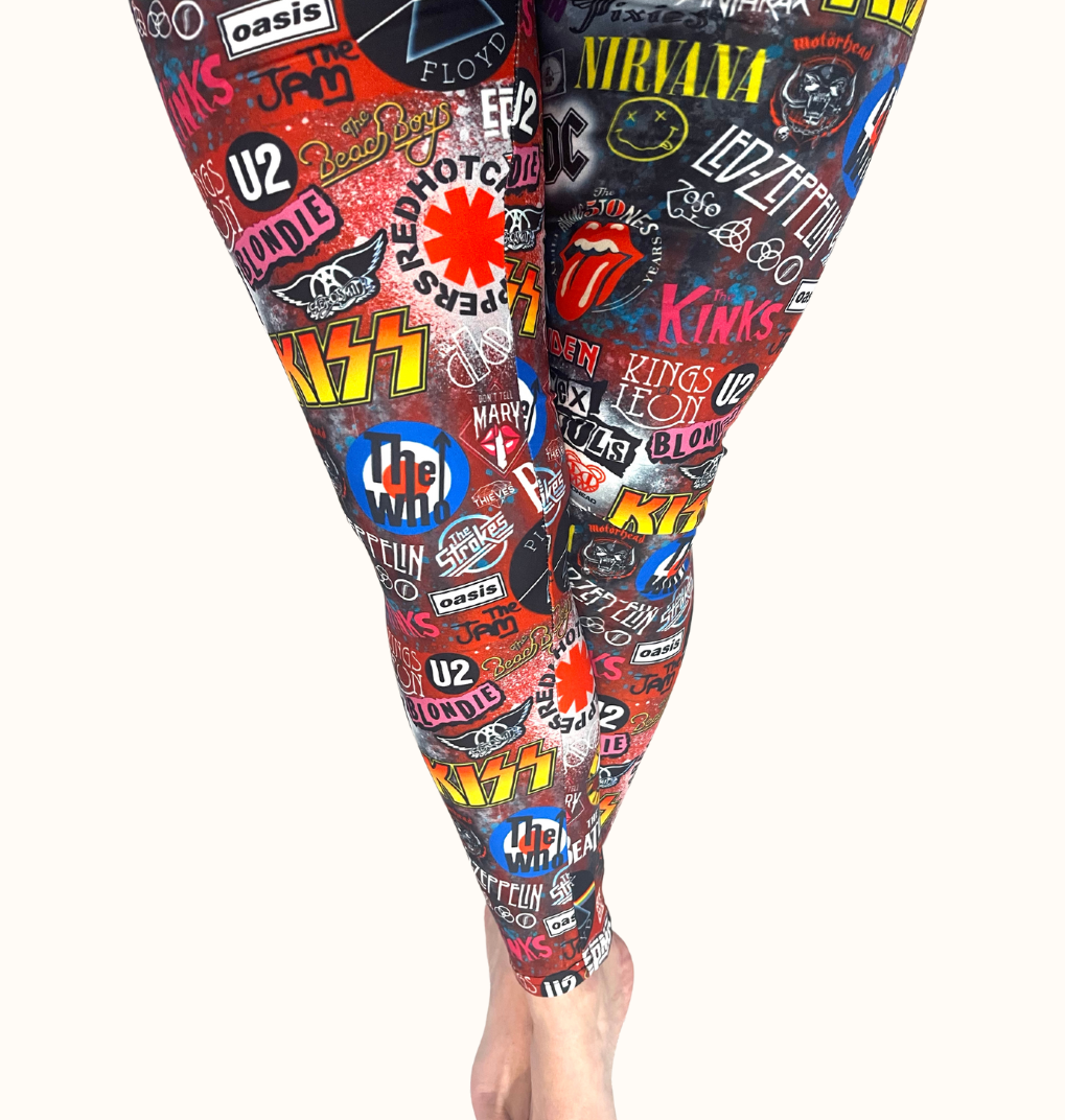 WOMAN WEARING EXTRA PLUS ROCK BAND LEGGINGS