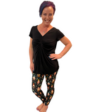 WOMAN WEARING EXTRA PLUS LEGGINGS WITH GNOMES