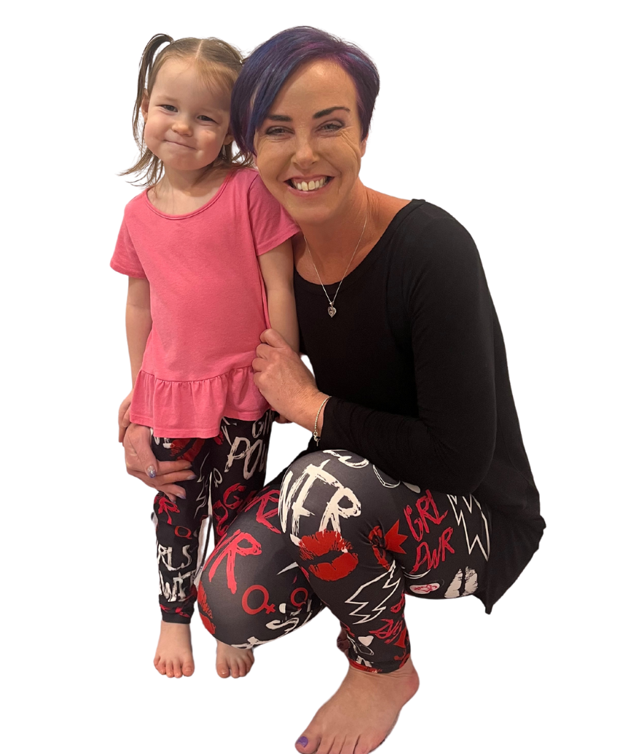 Mom and daughter wearing girl power leggings