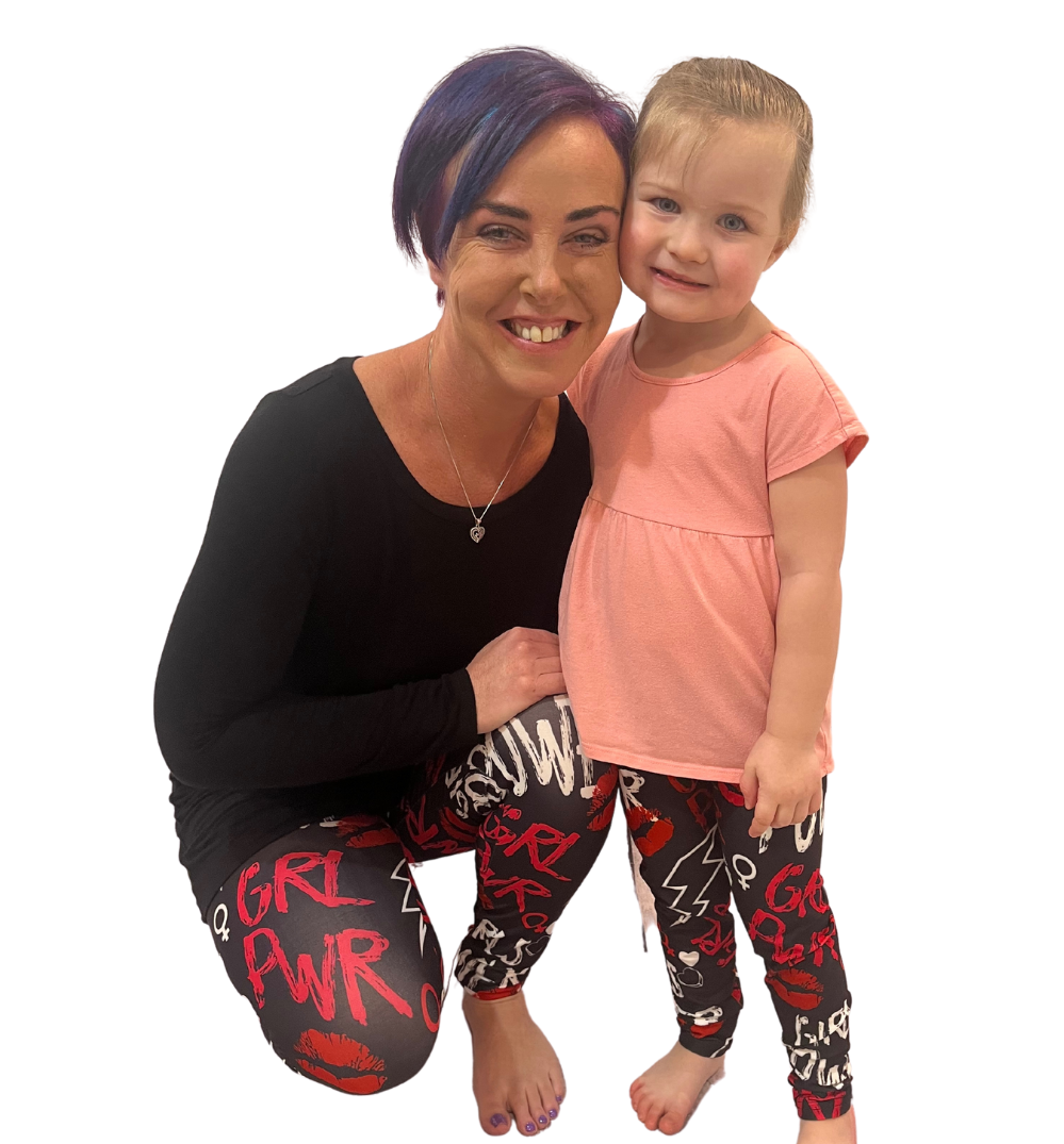 Mom and daughter wearing matching girl power leggings