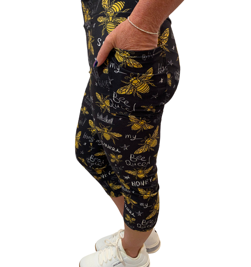 WOMAN WEARING CAPRIS WITH BEES