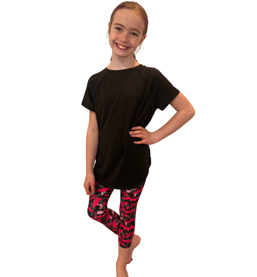 TWEEN WEARING PINK CAMOUFLAGE LEGGINGS